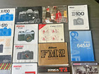 One Large Group Of 35 Mm Camera Instruction Manuals    2