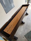 Wood Shuffleboard Table With Metal Legs And Scoring Zones