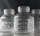 Lot Set 4 Vtg Glass Baby Bottles Food Jar Milk Formula Embossed Nursery 3oz 90ml