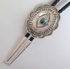 Sterling Silver   Turquoise Intricately Stamped Domed Concho Style Bolo Tie