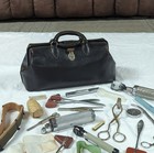 Antique Doctor Bag With Vintage Medical Instruments And Supplies