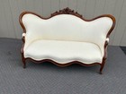 67764 Victorian Carved Walnut Sofa With Cream Upholstery