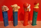 4 Vintage  70s Pez Dispensers Goofy  Chick  Little Pig Austria   Santa Slovenia