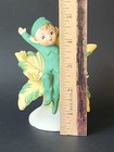 Vintage Brinn s Ceramic Pixie Elf Bisque Figurine Sitting On Flower Read