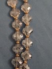 Smoky Quatrefoil Glass Strand