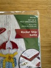 New Bucilla Santa Rocket Ship Felt Ornament Kit -s