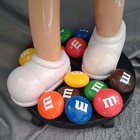 Yellow M m Store Display