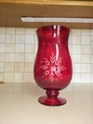 Beautiful Red And Black Vases That Were Going To Be Decorations At A Wedding