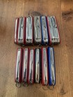 Lot Of 12 Victorinox Swiss Army Pocket Knives Various Models Champ  Walnut  abv 