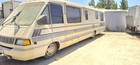 1990 Winnerbago Elandan Rv  Off White With Light Blue Stripes
