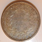 1865 Colombia Un Peso Coin