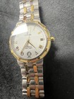 Cyma Swiss Made Men s Two-tone Steel Gold White Roman Dial Quartz Date Watch