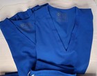 Figs Technical Collection Women   s Small Oversized Scrub Top Blue 2 Pockets