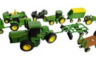 Lot Of 11 Ertl John Deere Tractors  Trailers  And Other Farm Equipment