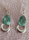 Aqua Colored Dangle Earrings With Faceted Crystal Set In Silver