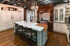 Plain   Fancy Traditional Multi-tone Kitchen With Island And Dry Bar