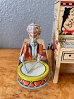1945 Unique Art Mfg  Co  Lil Abner Dogpatch 4 Band Tin Litho Windup Toy