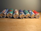 Coca Cola Collectible Cans - 7 Cans - Lips  House  Reindeer  Original Taste etc 