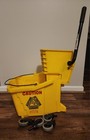 Rubbermaid Commercial Dual Water Mop Bucket 7570 And Press Wringer Co 6127