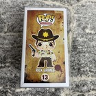 Funko Pop  The Walking Dead  Rick Grimes  13 Harrison s Comics Exclusive Bloody