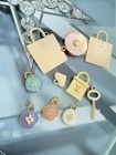 Lot Of 10 Lv Buttons And Zipper Pulls