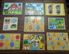 Melissa   Doug Wooden Puzzle Storage Case  9 Peg Puzzles Included     holds 12 