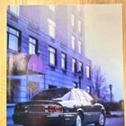 1998 Buick Park Avenue Black Sedan City Apartment Vintage Print Ad Car Advert