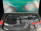 Logitech Cordless Desktop Wave Ergonomic Keyboard M720 Laser Mouse 920-000264