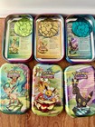 Prismatic Evolutions Mini Tin Complete Set Of 8  tin   Card   Coin   Box  Empty