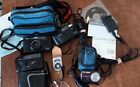 Collection Of Family s Cameras With Carrying Cases books 
