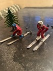 2 Vintage Barclay Manoil Red Skiers  Pine Tree Christmas Lead Figures 1940   s