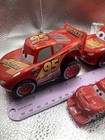 Disney Lightning Mcqueen Car Lot 4 Cars Largest Is Rev And Go Pixar Cars