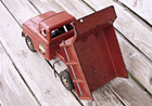 Vintage Bronze Orange Pressed Steel  Hydraulic Dump Truck Toy Works Made In Usa