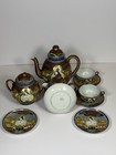 Partial Hand-painted Satsuma Tea Set With Gilded Figures And Motifs