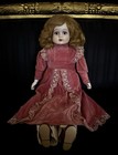 Haunted Porcelain Doll    sandy      Active   Curious Young Child Spirit  25 Inches