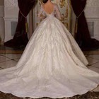 Luxury Wedding Dresses Sweetheart Neck Long Sleeves Backless Beaded Bridal Gowns