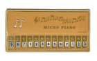 Vtg 1980s Melody    micro Piano    Mini Keyboard Song Book Button Battery Operated