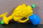Atomic Space Alien Water Squirt Gun Yellow Eagle Pistol Vintage