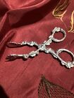 Pr Late 19th Century Silver Sugar Nips With Foliate Decoration 