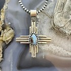 Sterling Silver Southwestern Style Teardrop Golden Hill Turquoise Zia Pendant