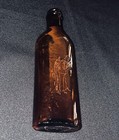 Vintage Embossed Fish Fisherman Brown Bottle 8  Unmarked Kitsch Lake River Cabin