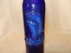 Cobalt Blue Embossed Bottle With 2 Dolphins Jumping Out Of Water 11 75  Tall
