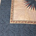 Handmade Mariner s Compass Quilt Featuring A Central Mariner s Or Compass Star