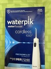 New Sealed Waterpik Cordless 1000 Rechargeable Water Flosser 1 Tips 2 Settings