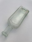 Antique Burnett s Standard Flavoring Extracts Embossed Aqua Bottle