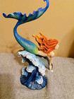 Red Haired Mermaid Figurine Riding The Waves On A Dolphin Fin Repaired