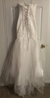 Elegant White Mermaid-style Wedding Dress With A Strapless Sweetheart Neckline