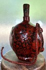 Early 20th-c Handmade Mongolian Red   Black Leather Flask  12 75   x8 25   