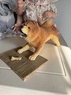 Happy Chow Dog With Bone Sculpture