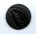 Fantastic Licorice Bakelite Button-- Nicely Carved W  Leaf On Textured Bkgrnd-lg